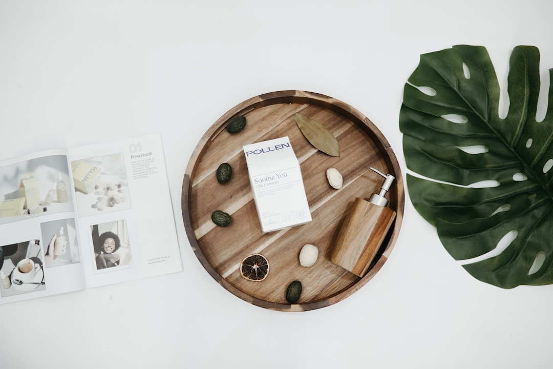 Natural organic lifestyle products arranged on soft linen fabric with botanical elements